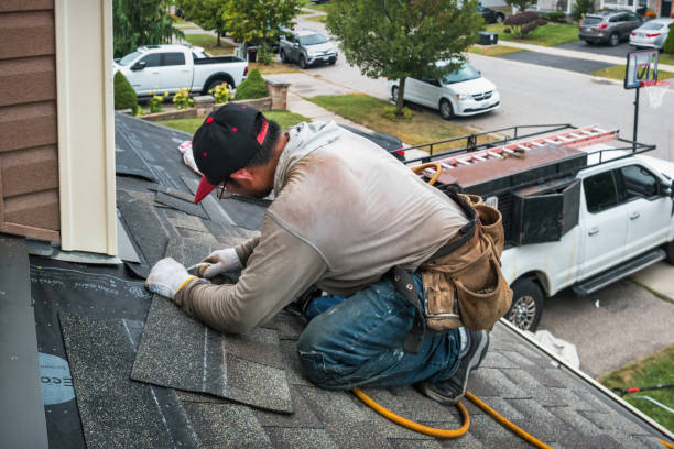 Professional Roofing technician working in North Tazewell, VA